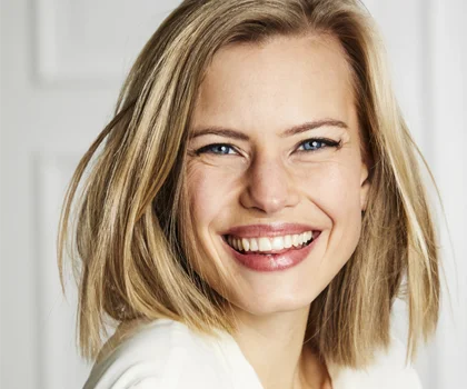 Portrait of a woman smiling broadly